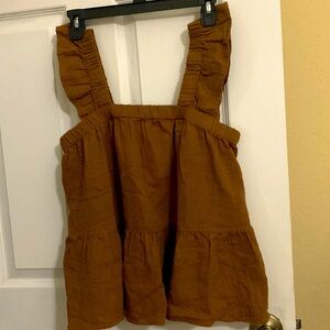 Pretty brown top  didn’t fit me. Brand is SO size medium.